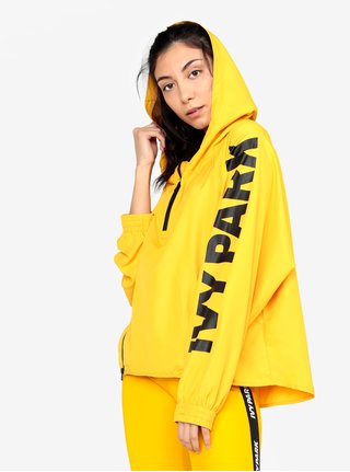 Žlutý šusťákový anorak s kapucí Ivy Park