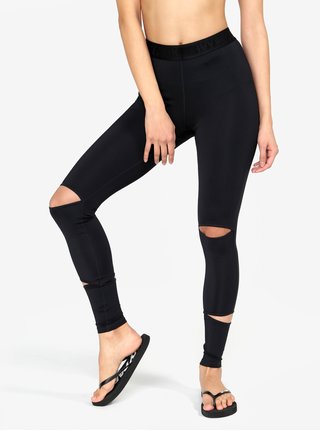 Černé legíny s průstřihy na nohavicích Ivy Park