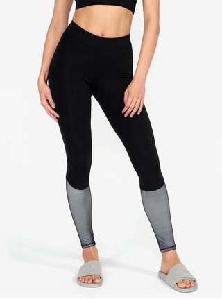 Černé legíny se síťovanou částí na nohavicích Ivy Park