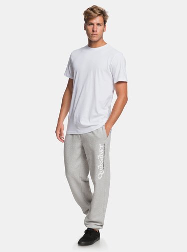 Světle šedé žíhané tepláky s potiskem Quiksilver