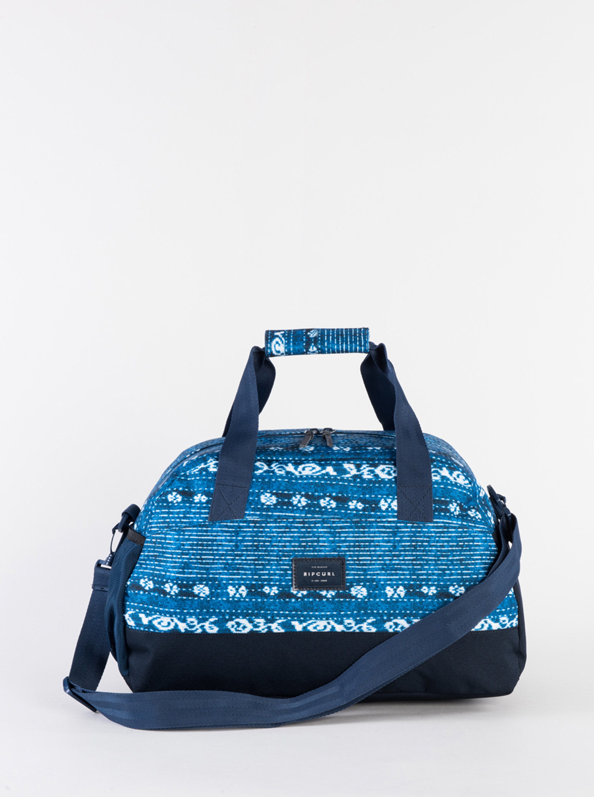 Modrá vzorovaná cestovní taška Rip Curl